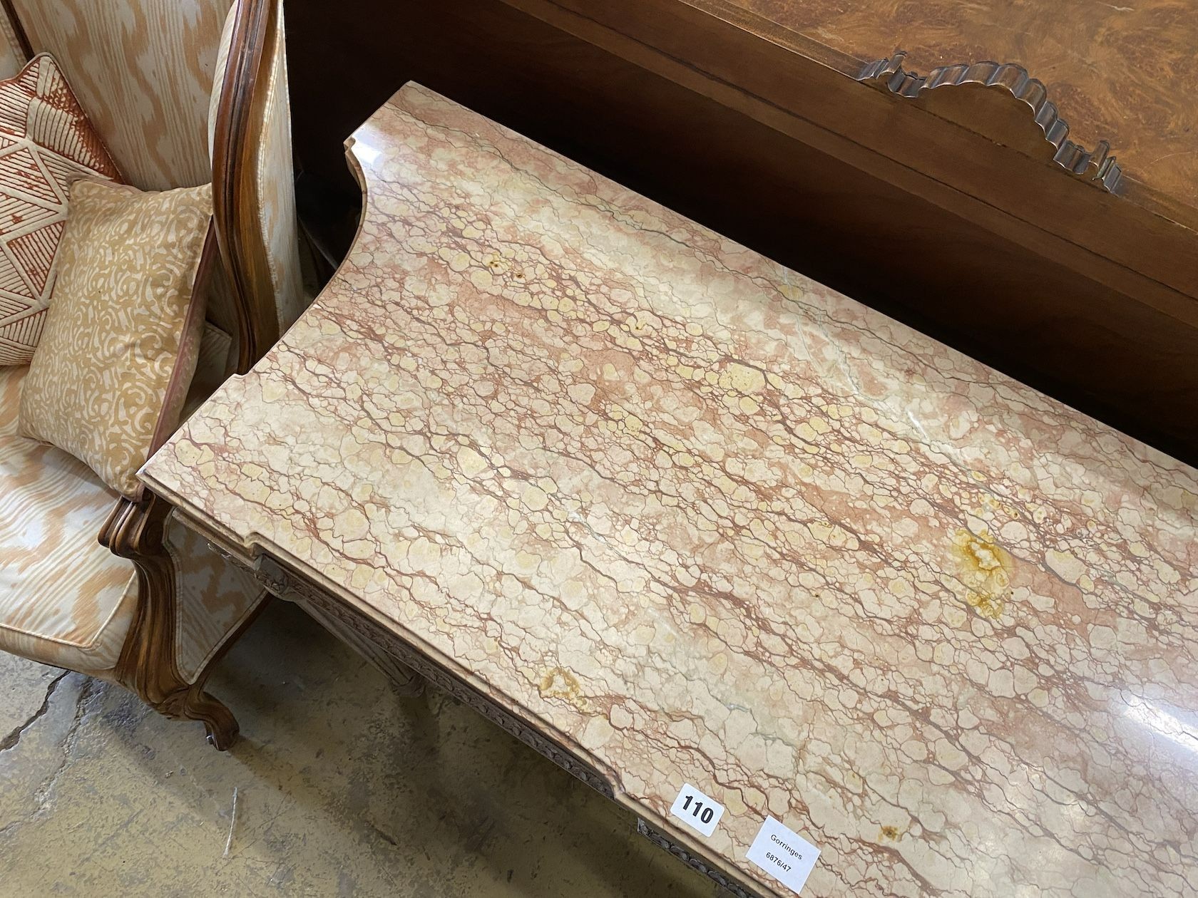 A Louis XVI style white painted carved wood marble topped two drawer console table, width 110cm, depth 47cm, height 82cm